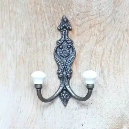 Crochet double cuivre antique avec boutons en porcelaine
