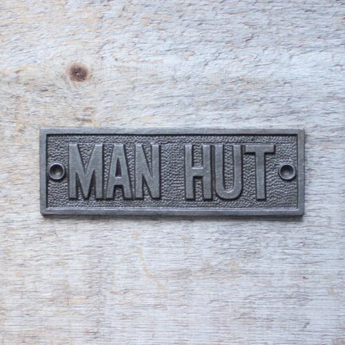 ManHut cast iron sign