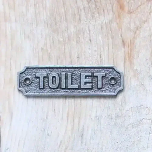 Toilet cast iron sign