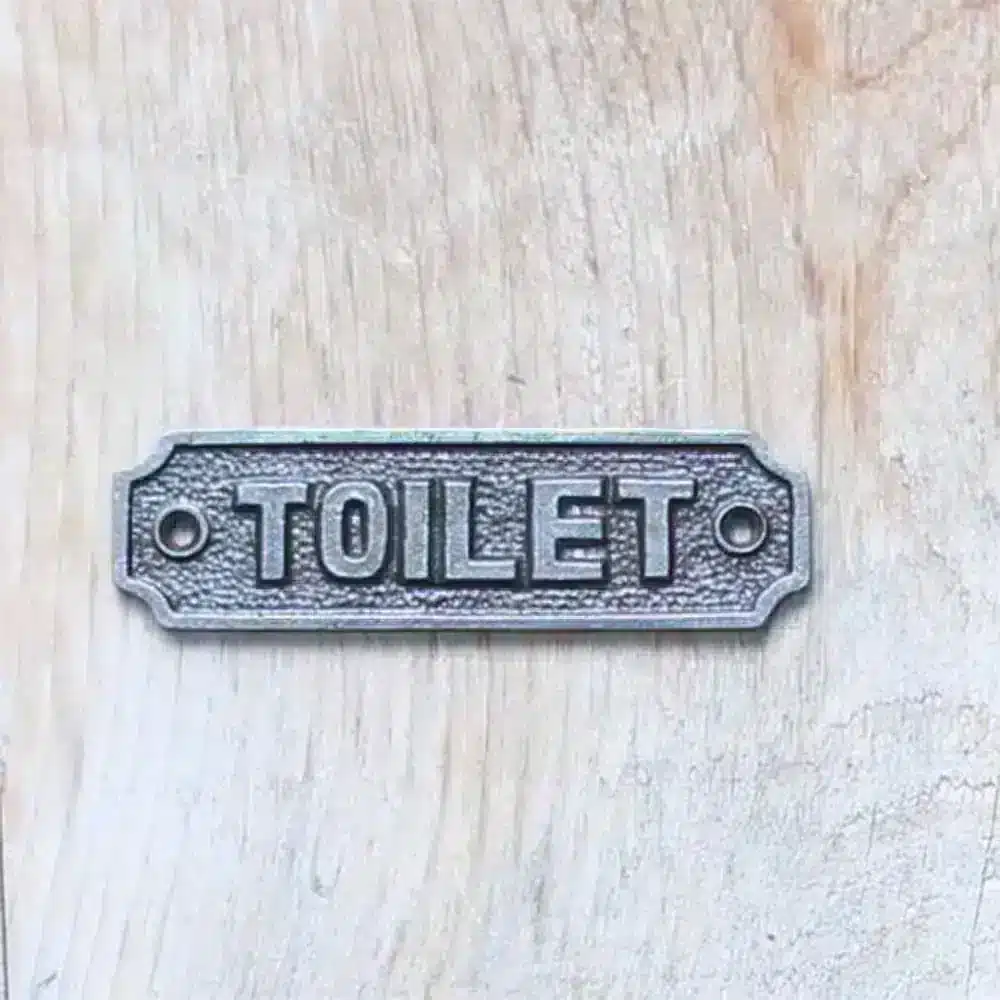 Toilet cast iron sign